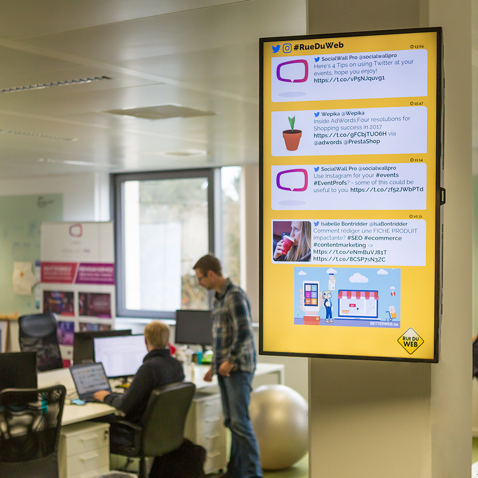 social media wall on a screen in workplace